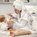 beautiful stylish couple field wirh sunflowers scaled